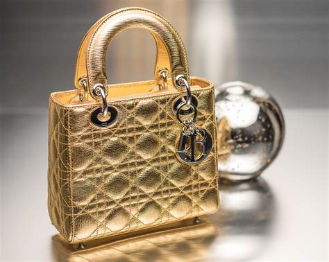 dior gold pouch|Dior pouch women.